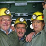 Bergleute in Originalmontur - bereit zum Schachteinfahren